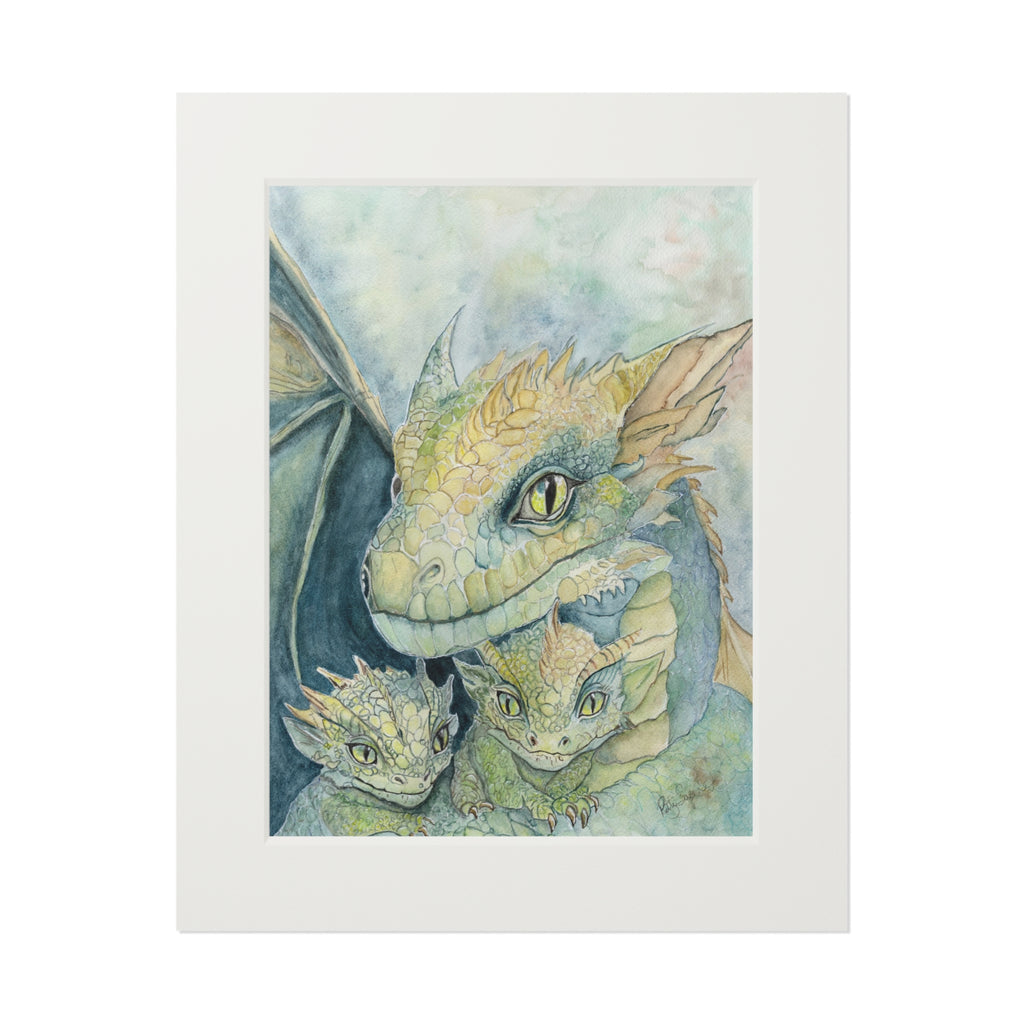 Matted fine art print of a tender watercolor green mama dragon sheltering two baby dragons in soft teal and gold tones by Patty Sapere